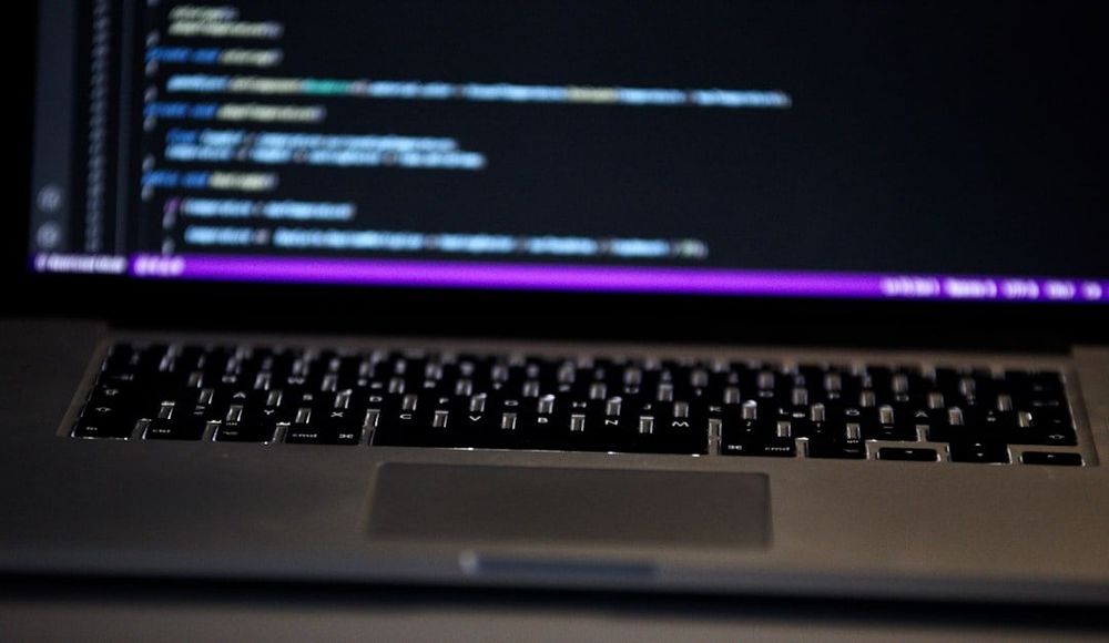 a close up of a laptop computer keyboard