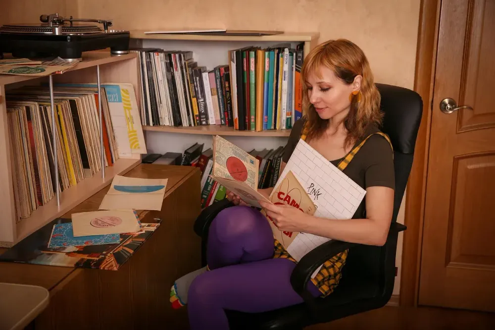 vinyl records, vinyl collection, young woman, music library, music, records, studio, songs, caucasian, vinyl, listen to the music, retro, vintage, room, shelves, interior, meloman, collection, sorting, choose, select track, album's cover, vinyl, vinyl, sorting, sorting, sorting, sorting, sorting, choose